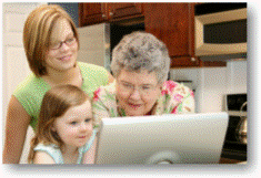 Family looking at a Computer screen